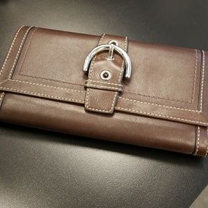 Brown leather COACH buckle checkbook wallet